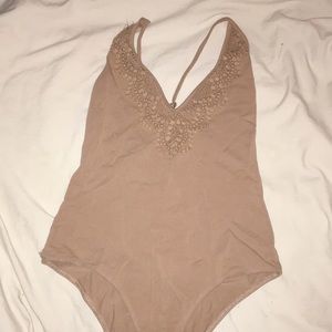 Tan bodysuit